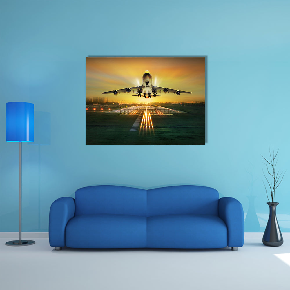 A Lit View Of Passenger Plane During Takeoff From Runway Multi Panel Canvas Wall Art