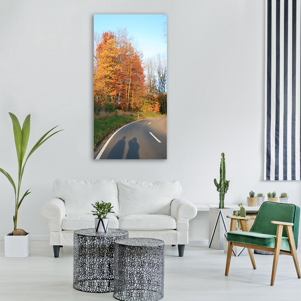 shadow play human autumn road Vertical Canvas Wall Art