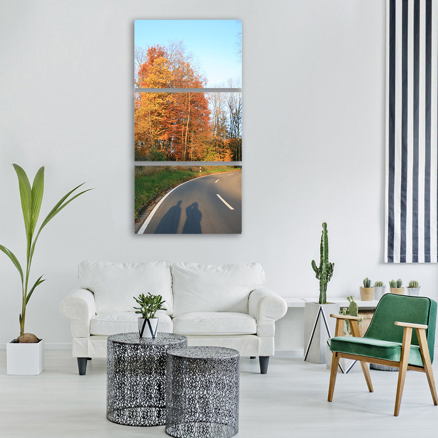 shadow play human autumn road Vertical Canvas Wall Art
